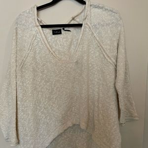 Out from under sweater
